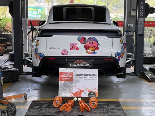 أحدث حالة شركة حول 2025 Tesla Model Y Refreshed Version AWD Upgraded with EDDY Adjustable Comfort Shock Absorber Kit